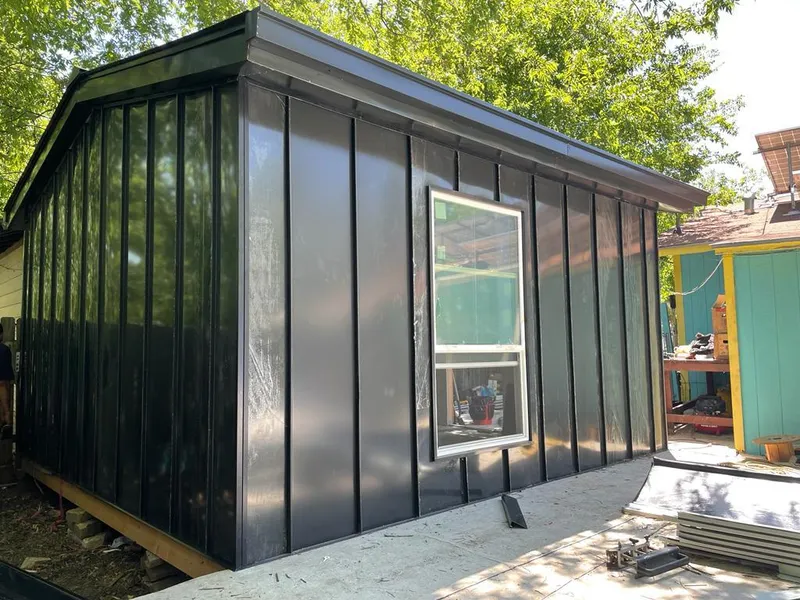 Black standing seam metal wall panels for Roof Inspection in Long Branch